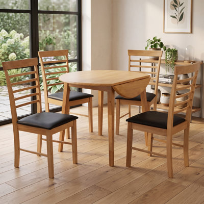 Bowerbank Extendable Round Solid Wood Dining Table