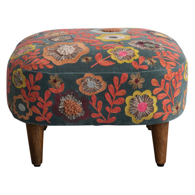 Tabouret en bois avec coussin en mousse
