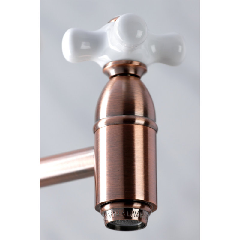 Kingston Brass Restoration Two-Handle 1-Hole Wall Mount Pot Filler Faucet, Antique Copper
