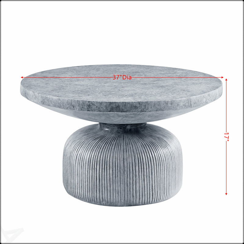 Table basse ronde à finition grise Laddie, parfaite pour les petits espaces et les intérieurs modernes