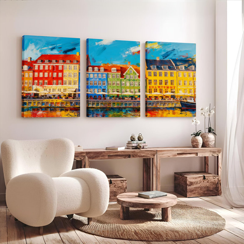 Ensemble de 3 tableaux sur toile représentant des maisons colorées au bord du canal, H 18 po x l 36 po