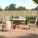 Justin 4 - Person Teak Wood Patio Dining Set with Round Table