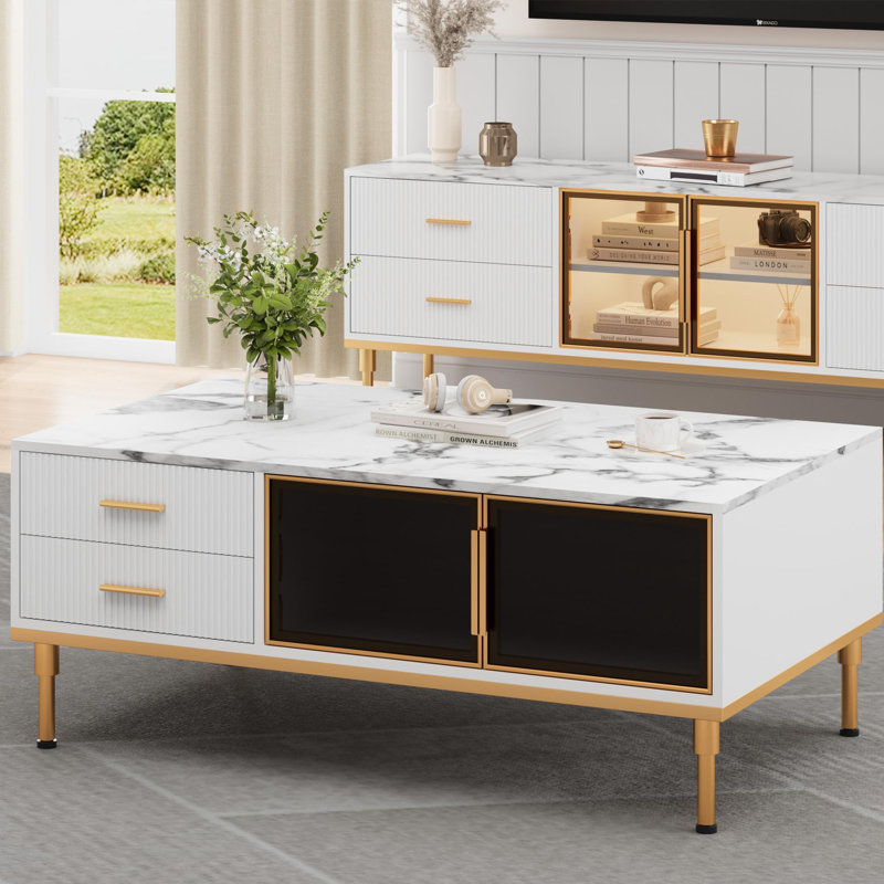 Table basse moderne avec surface en faux marbre, rangement pour porte en verre, tiroir cannelé, pieds en métal, table de salon minimaliste