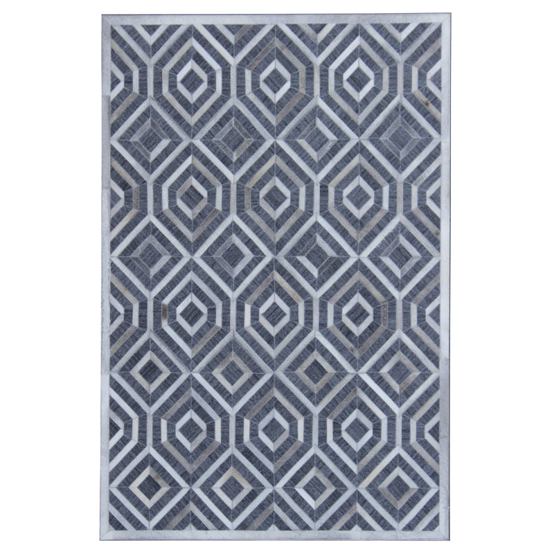 Tapis gris/blanc handwoven à tissage plat vache Simeon