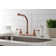 Kingston Brass Two-Handle 4-Hole 8" Centerset Kitchen Faucet with Side Sprayer