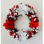 Couronne de Noël rouge et blanche pré-éclairée avec poinsettias et baies