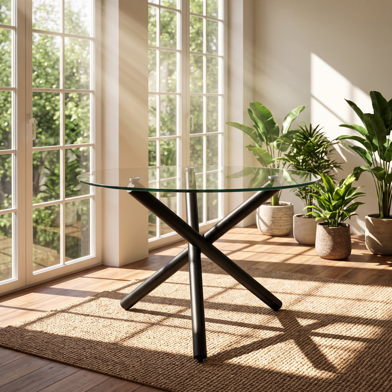 Table de salle à manger EGO, plateau en verre trempé, structure en métal noir, dimensions : 110 cm (L) x 110 cm (P) x 74 cm (H).