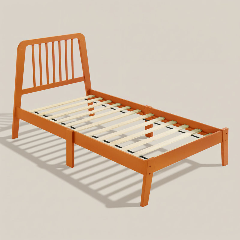 Lit plateforme simple en bois massif avec tête de lit à barreaux Bustillo, Orange