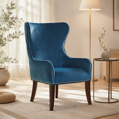 Chaise d'appoint bleue capitonnée en polyester à 4 pieds