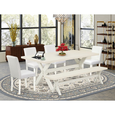 A0969529EBC543189FD62D5F8C1D8F55 Ensemble de table de salle à manger 6 pièces avec table de salle à manger et petit banc - 4 chaises Parson en similicuir de polyuréthane
