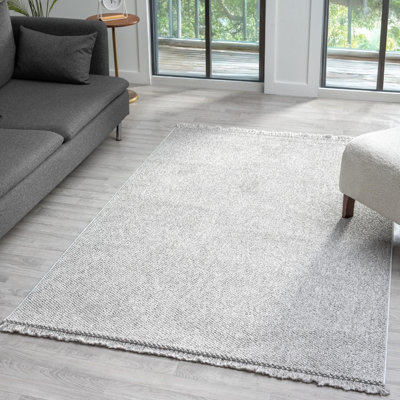 Tapis texturé à franges