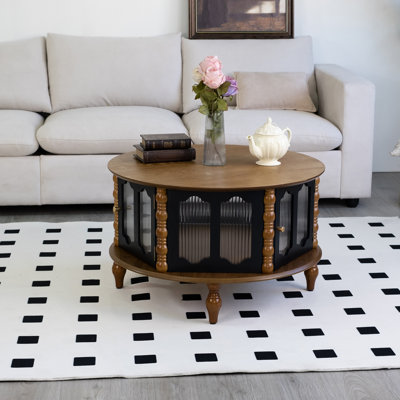 Table basse ronde avec rangement à trois portes