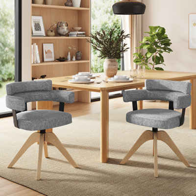 Chaise rembourrée moderne avec dossier incurvé et base en bois d'hévéa