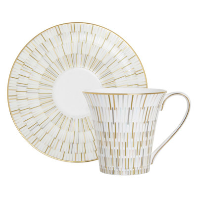 Tasse et soucoupe lumineuses en porcelaine tendre