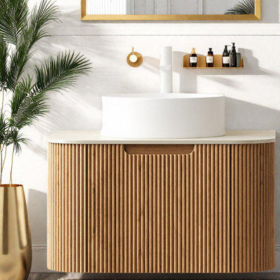 Meuble-lavabo et lavabo flottant moderne avec lavabo en céramique élégant et plateau en pierre