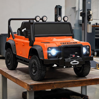 Ride-On Cars combinant espace extérieur et acier avec éclairage à DEL et plastique orange, plastique et acier