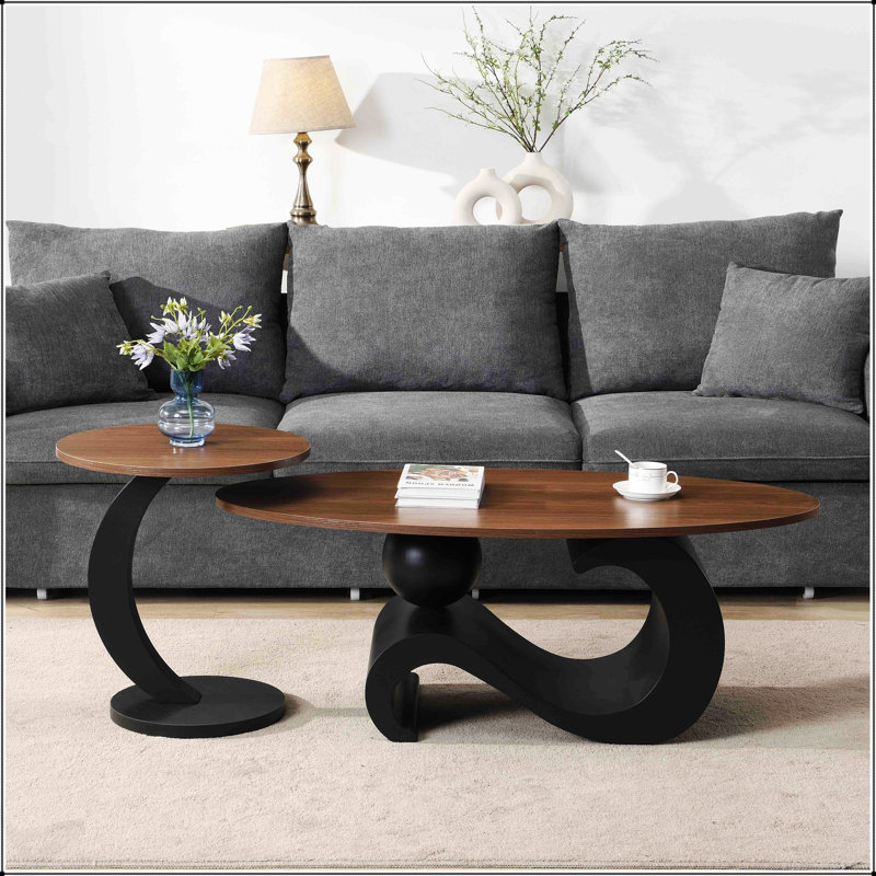 Ensemble de 2 tables basses gigognes noires, ovales et rondes pour des espaces de vie modernes et polyvalents
