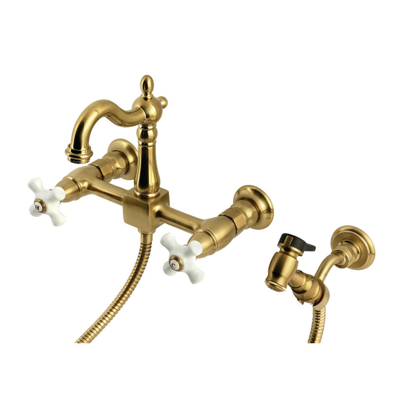 Kingston Brass Heritage Double-Handle 3-Hole Wall-Mount Bridge Kitchen Faucet with Brass Sprayer, Brushed Brass