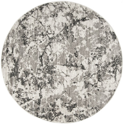 Tapis gris / ivoire Strasser
