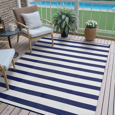 Tapis d'extérieur à rayures bleues et blanches Classic