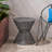 Nevada Durable Iron Side Table With Breezy Mesh Design For Outdoor And Indoor Use, Perfect For Summer Relaxation And Stylish Decor.