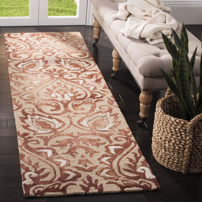 Pimentel Hand Tufted Wool/Cotton Geometric Rug in Copper