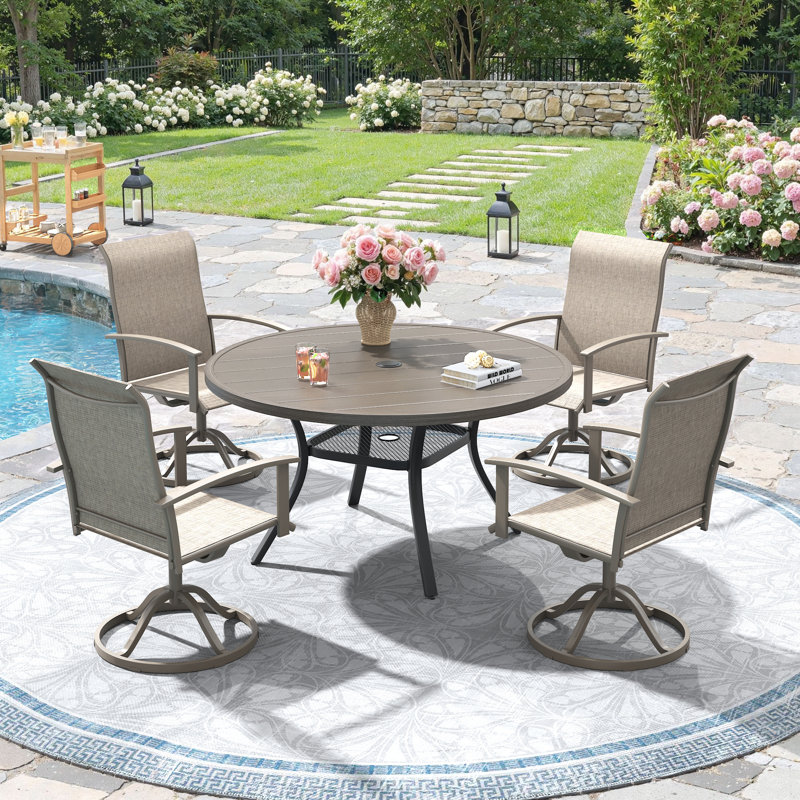 Ensemble de salle à manger pour 4 personnes avec table ronde en métal et chaises pivotantes PVC-coated polyester