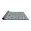 Tapis mauve/vert à tisser électrique-158563821