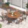 Round Patio Dining Set with 60" Metal Dining Table and 8 Stackable Armrest Textilene Chairs