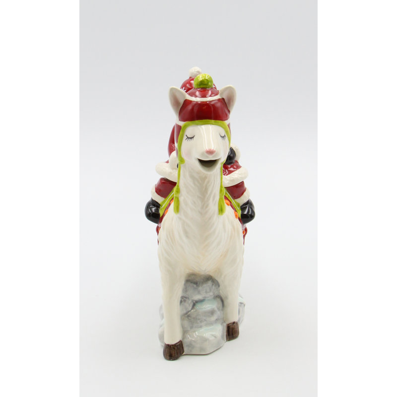 Lama en céramique avec théière du père Noël