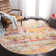 Felty Abstract Beige Area Rug