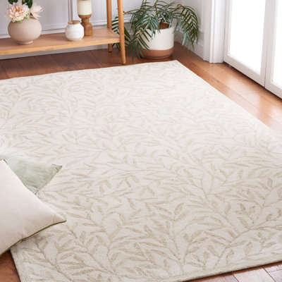 Tapis floral en laine / coton touffeté à la main Jaci ivoire / beige