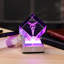 Figurine en cristal gravée en 3D représentant un caducée, avec socle lumineux DEL aux couleurs changeantes.