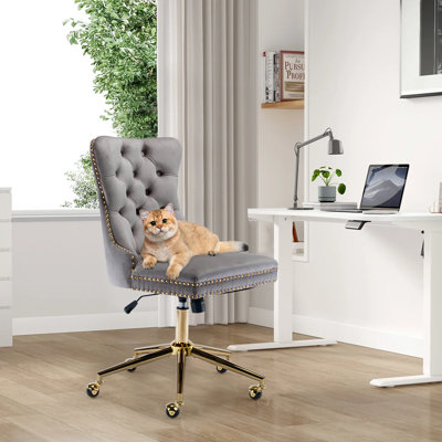 Chaise de bureau en velours et capitonnée