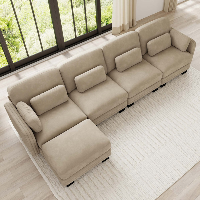 Canapé d'angle modulaire capitonné avec pouf amovible