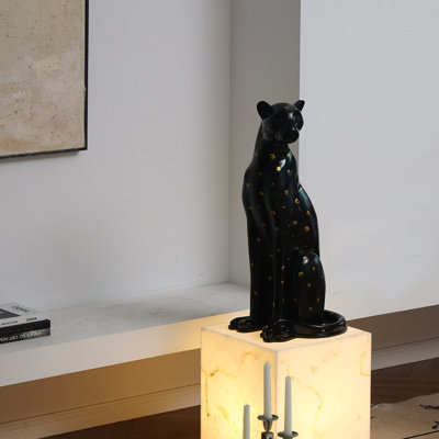 Panthère assise tachetée or noir, objet décoratif en fibre de verre