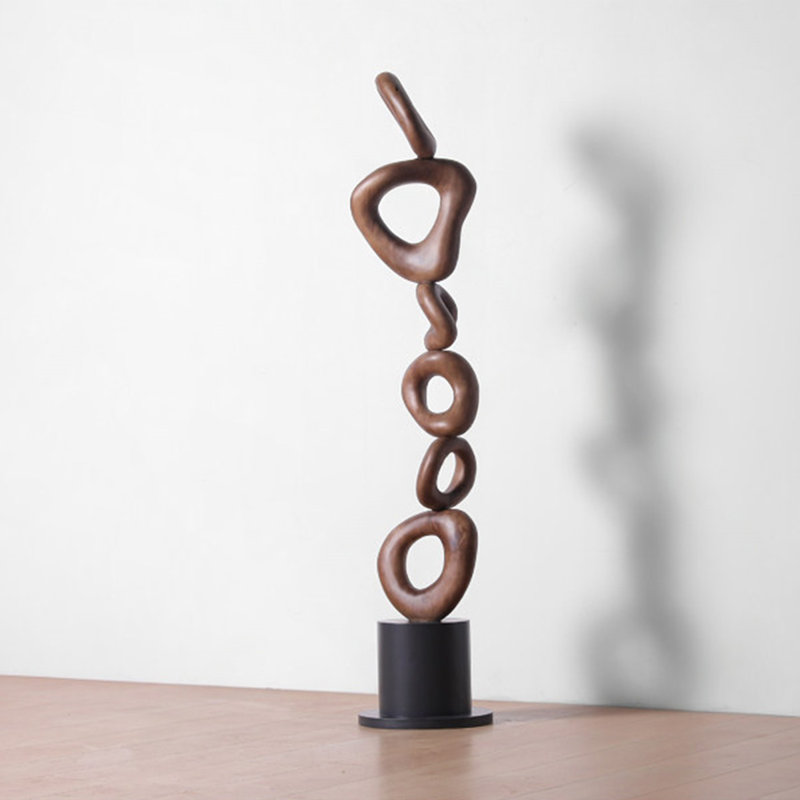 Objet décoratif en bois massif brun et noir