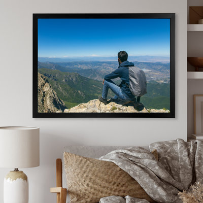 " Young Man Hiking Mountain "
