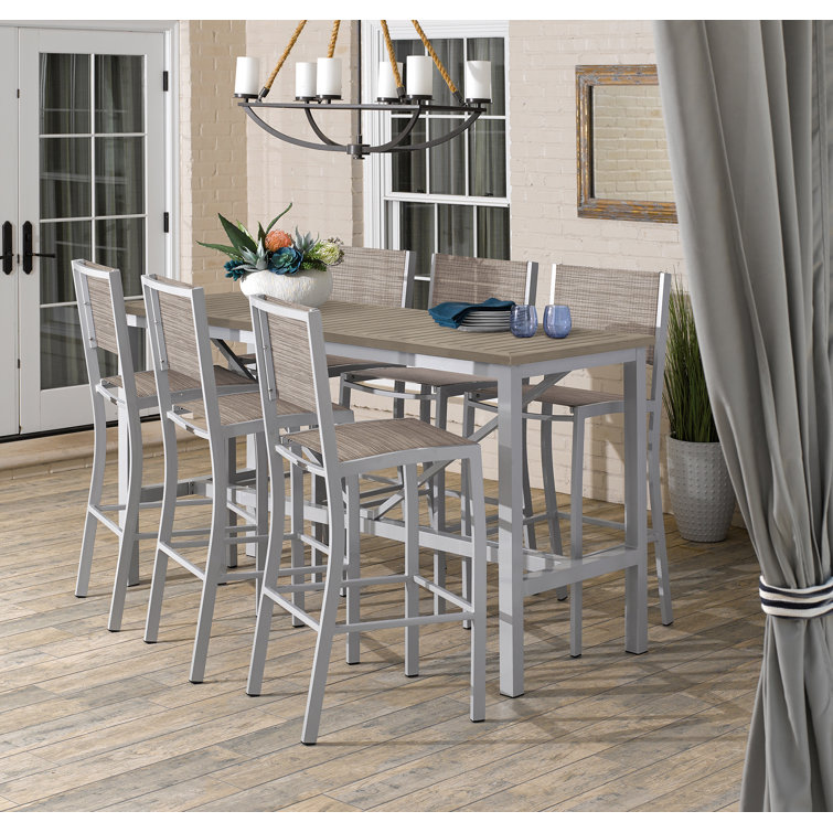 Travira 7-Piece Bar Table and Sling Bar Chair Rectangular Dining Set - 72"x30"