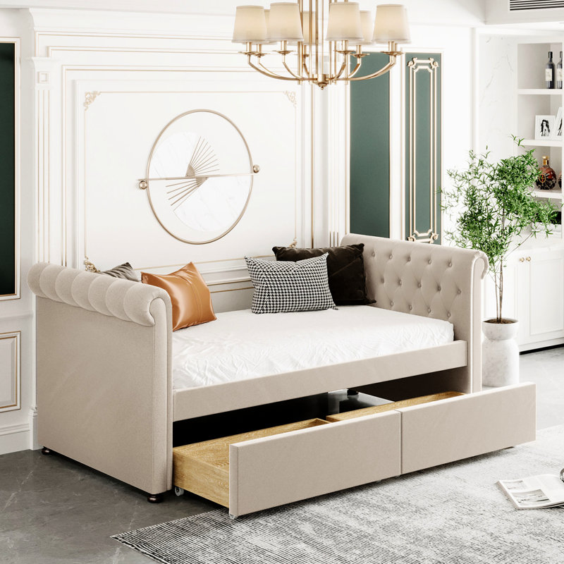 Lit de jour simple rembourré beige avec tiroirs, structure en lattes de bois stables, rangement confortable, structure solide, mobilier de chambre moderne