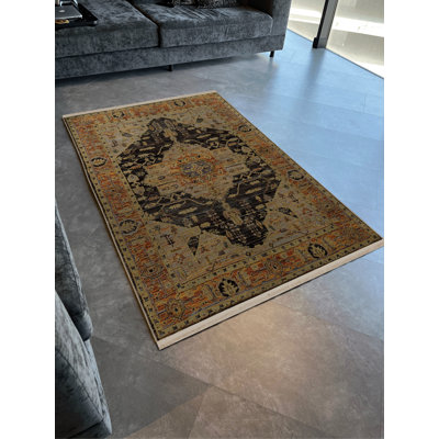 Tapis décoratif à motif frangé noir et orange