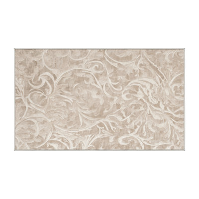 Tapis beige lavable à la machine