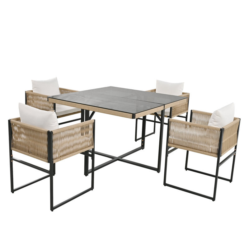 Banfield 4 - Person Patio Dining Set with Rectangular Table , Cushions Included