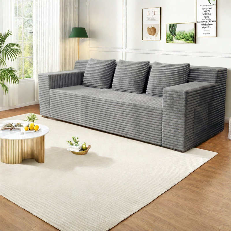 Canapé gris clair peu encombrant, design minimaliste en mousse, mobilier polyvalent
