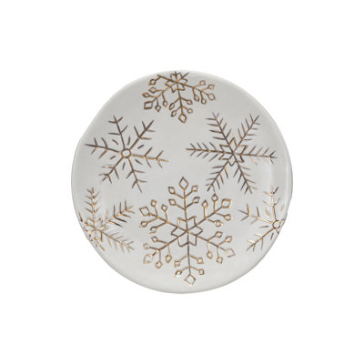 Assiette en grès avec des flocons de neige électrolytiques dorés