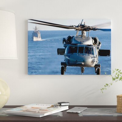 An MH-60S Seahawk Helps Conduct a Vertical Replenishment' Photographic Print on Canvas -  East Urban Home, A6280A49929E4F5B81057B03FADF1094