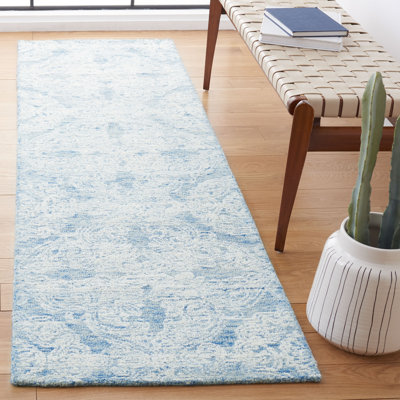 Huntleigh Oriental Handmade Wool Blue / Ivory Area Rug