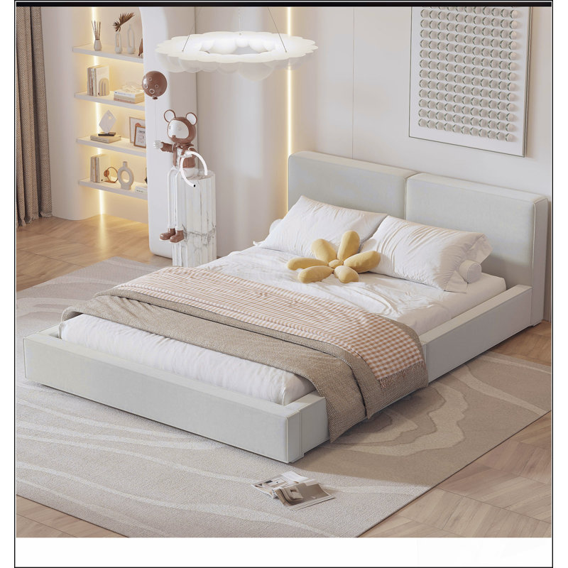 Grand lit plateforme tapissier grand format avec tissu en velours, structure solide et finition beige élégante pour les chambres modernes
