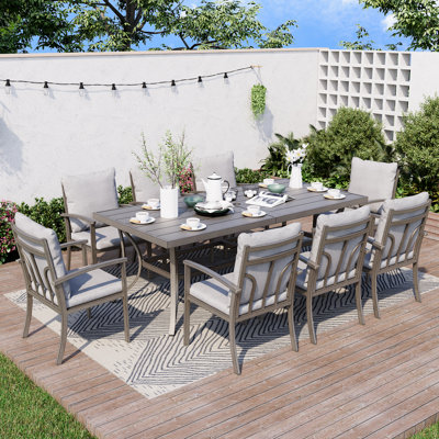 Freada 8 - Person Patio Dining Set with Rectangular Table , Cushions Included