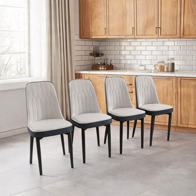 Chaise d'appoint courbée à dossier incurvé avec revêtement en similicuir et pieds en métal noir, ensemble de 4 pour salle à manger